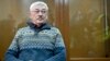 Oleg Orlov attends his verdict hearing in Moscow on February 27.