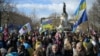 People gather on February 25 at the Place de la Republique in Paris as they take part in a demonstration in solidarity with Ukraine.