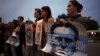 People take part in a demonstration near the Russian Embassy in Rome after the death of Russian opposition leader Aleksei Navalny on February 16.