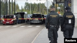 Cars wait to enter Finland from Russia at Finland's southernmost crossing point, Vaalimaa.