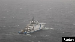 A Finnish Border Guard vessel patrols the waters above the location where an underwater pipeline between Finland and Estonia was damaged. 