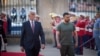 Czech President Petr Pavel walks with Ukrainian President Volodymyr Zelenskiy outside Prague Castle on July 6.