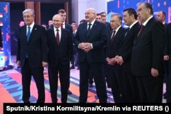 Kazakh President Kassym-Jomart Tokayev, Russian President Vladimir Putin, Belarusian President Alyaksandr Lukashenko, Uzbek President Shavkat Mirziyoyev, Kyrgyz President Sadyr Japarov, and Tajik President Emomali Rahmon tour an exhibition center outside Kazan, Russia, on February 21, 2024.