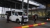 People get off a bus at the border crossing from Russia at the Vaalimaa border station in Finland.