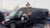 WATCH: Navalny's Mother Bids Farewell To Her Son At Cemetery 