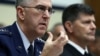 General John Hyten (left) testifies during a hearing before the House Armed Services Committee in March 2017 in Washington, D.C.