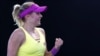 Ukraine's Kateryna Baindl celebrates after winning against Russia's Kamilla Rakhimova in their first round match at the Australian Open tennis championship in Melbourne on January 16. 