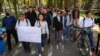 More than 100 people march in support of independent media in Bishkek on October 14.