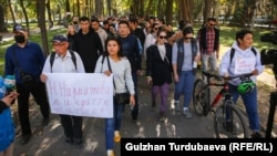 More than 100 people march in support of independent media in Bishkek on October 14.