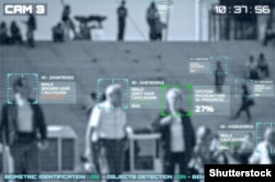 Simulation of a screen of closed-circuit TV cameras using live facial-recognition software.