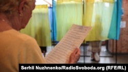 Во время голосования на выборах парламента Украины. Киев, 21 июля 2019 года