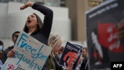 People demonstrate against the Iranian regime during a protest in Toronto in September.