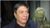 Bolot Temirov is detained by security forces in Bishkek on January 23.