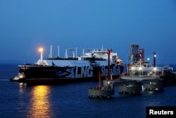 An LNG tanker docks at a terminal in Zhoushan, China, in August 2018.