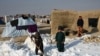 PHOTO GALLERY: 'The Coldest In Recent Years': Dozens Killed In Afghanistan (click to view)