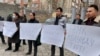 Supporters of NEXT TV protested on March 5 in Bishkek against the channel's journalists being questioned over their Ukraine coverage.