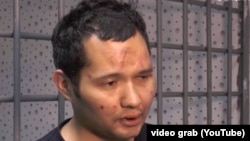 Vikram Ruzakhunov was shown on a Kazakh television channel with severe bruises on his face.