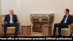 Aslan Bzhania meets Syrian President Bashar Al-Assad in Damascus. 