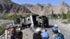 A burned-out truck sits on a road near the Kyrgyz-Tajik border in the village of Ak-Say, some 1000 kilometers from Bishkek, on September 20.