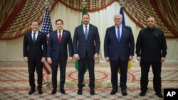 From left, US National Security Advisor Mike Waltz, US Secretary of State Marco Rubio, Ukrainian Head of Presidential Office Andriy Yermak, Ukrainian Foreign Minister Andrii Sybiha, and Ukrainian Defense Minister Rustem Umerov pose for a photo after meeting in Jeddah, Saudi Arabia, on March 11, 2025.