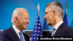 U.S. President Joe Biden (left) attended a meeting in Warsaw with NATO chief Jens Stoltenberg (right) and the heads of Eastern European countries in a bid to shore up support for Kyiv nearly a year after Russia invaded Ukraine. (file photo)