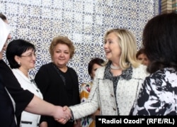 Clinton meets Tajik women in downtown Dushanbe on October 22.