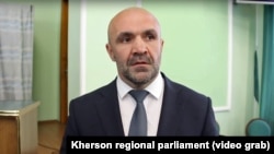 Vladyslav Manher, the head of the Kherson regional parliament, could face life in prison.