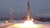 Russia's new Sarmat intercontinental ballistic missile blasts off during a test launch from an undisclosed location in Russia.