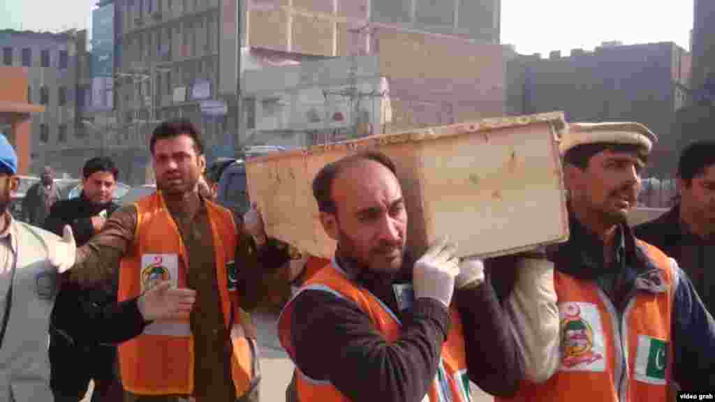 As the death toll from the attack rose, coffins were seen being loaded into vehicles in front of the hospital.