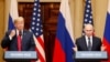 U.S. President Donald Trump (left) and Russian President Vladimir Putin speak to reporters in Helsinki on July 16.