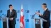 Georgian Prime Minister Giorgi Gakharia and NATO Secretary-General Jens Stoltenberg give a joint press conference in Brussels on September 29.