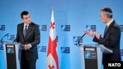 Georgian Prime Minister Giorgi Gakharia and NATO Secretary-General Jens Stoltenberg give a joint press conference in Brussels on September 29.