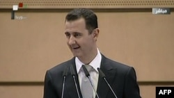 Syrian President Bashar al-Assad gives a speech in Damascus on January 10.