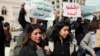 Protesters took to the streets in the Syrian capital, Damascus, to condemn the latest violence in Latakia Province on March 9.