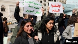 Protesters took to the streets in the Syrian capital, Damascus, to condemn the latest violence in Latakia Province on March 9.