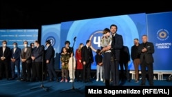 Georgian Dream candidates celebrate victory after the polls closed on October 2, with Tbilisi Mayor Kakha Kaladze addressing supporters.