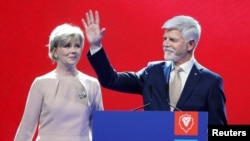 Petr Pavel and his wife, Eva Pavlova, greet supporters at his campaign headquarters in Prague after he was declared the winner of the country's January presidential election. 