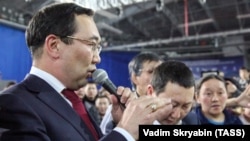 Regional leader Aisen Nikolayev speaks during a rally against illegal migration in Yakutsk on March 18. 