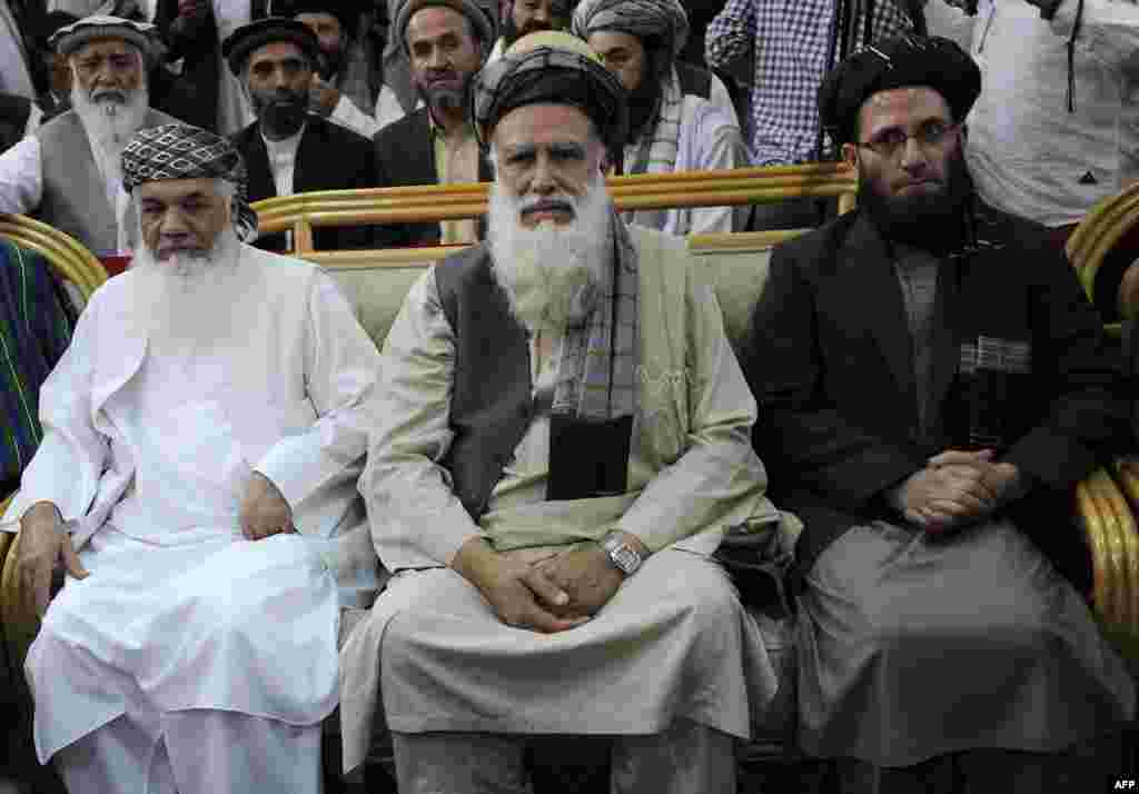 Abdul Rasul Sayyaf (center)   Pashtun   Vice-presidential running mates: Ismail Khan (ethnic Tajik) (left in photo) and Abdul Wahab Erfan (ethnic Uzbek) (right in photo)   Sayyaf (born in 1946) is an influential lawmaker from Kabul who is one of the most controversial and conservative of the candidates.   He is an Egyptian-trained cleric who is credited with bringing leading Al-Qaeda figures -- including former leader Osama bin Laden -- to Afghanistan during the Soviet occupation in the 1980s.   Sayyaf’s right-hand man, Khan, is the former energy and water minister. Khan, a former Tajik warlord from Herat Province, is referred to as the emir (or king) of western Afghanistan.  