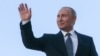 Russian President Vladimir Putin waves to the public after his fourth inauguration as president on May 7. 