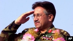 Pervez Musharraf salutes at a public rally in 2002 in Lahore, Pakistan.