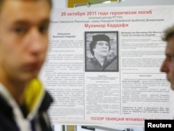 A memorial board for Muammar Qaddafi at the Russian State University of Trade and Economics in Moscow reads: "On October 20, 2011, Muammar Qaddafi died heroically. Shame on Muammar Qaddafi's killers."