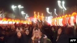 Thousands of Muslim Shi'ite women performed the Arbain mourning ritual outside the Imam Abbas Shrine in the Iraqi holy city of Karbala on February 3.