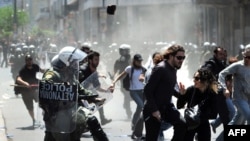 Riot police pursued protesters, during a May Day demonstration in Athens on May 1.