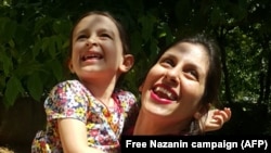 Nazanin Zaghari-Ratcliffe holds her daughter during her three-day release from prison last year.