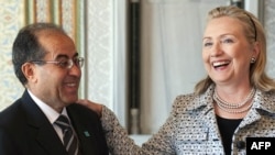 U.S. Secretary of State Hillary Clinton meets with Mahmud Jibril, chairman of Libya's opposition Transitional National Council, in Istanbul on July 15.