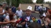 Ex-President Askar Akaev talks to reporters after returning to Kyrgyzstan in August.