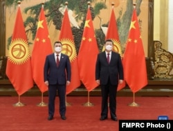 Chinese President Xi Jinping (right) met with Kyrgyz President Sadyr Japarov in February in Beijing.