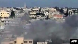 A video uploaded on May 23 shows smoke billowing from the rebel bastion of Al-Rastan.