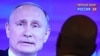 Russian President Vladimir Putin answering questions on TV during the annual Direct Line session on Russian TV channels and radio stations last year.